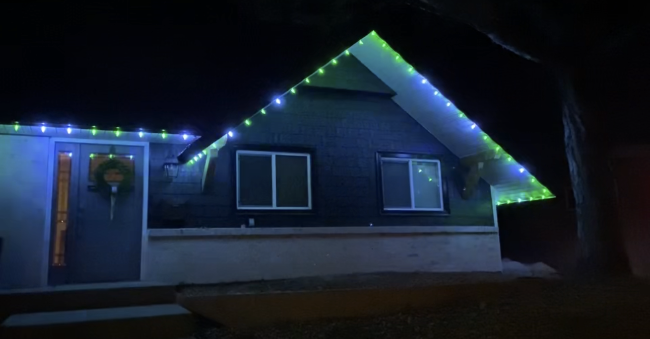 House with blue and green RGBW C9 Christmas lights