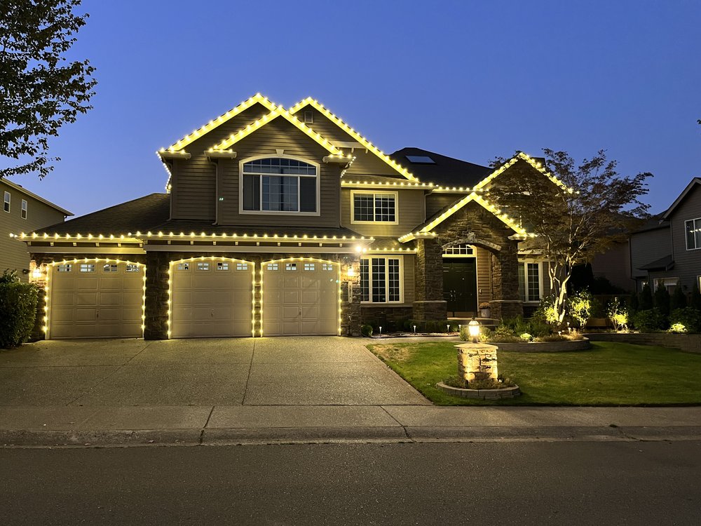 Pocatello two-story home with warm white roofline lighting